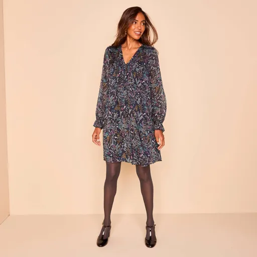 Rozšírené krátke šaty so
		zámikmi a farebnou potlačou lístkov