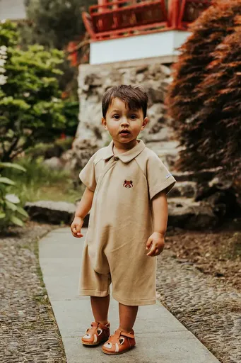 Detské bavlnené dupačky Donsje Adriaen Playsuit Red Panda