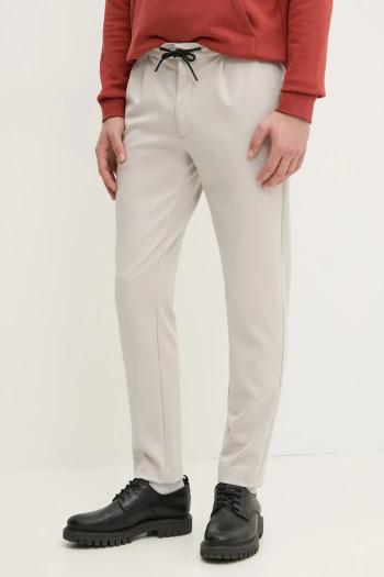 Nohavice Calvin Klein pánske, béžová farba, priliehavé, K10K113648