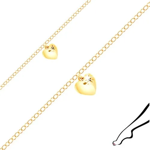 Náramok na členok zo striebra zlatej farby - lesklé srdiečko, čierny zirkón