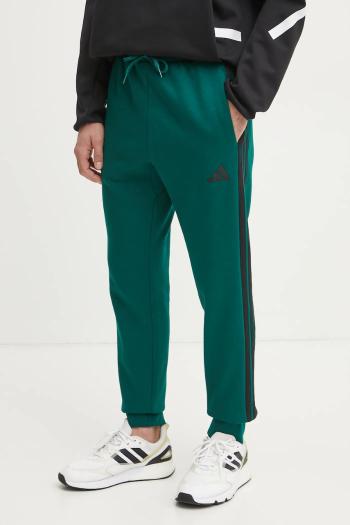Tepláky adidas Essentials zelená farba, vzorované, JD1860