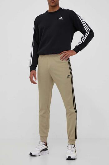 Tepláky adidas Originals béžová farba, s nášivkou