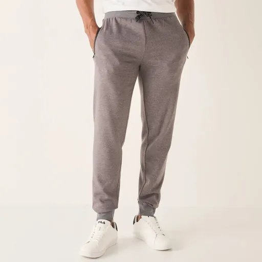 Športové nohavice so zúženými koncami a kontrastnými detailmi