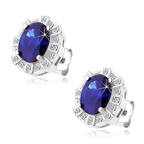 Ródiované náušnice, striebro 925, tmavomodrý oválny zirkón v ozdobnom leme