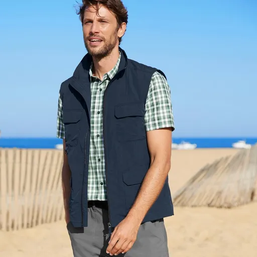 Vesta na zips so stojačikom a vreckami