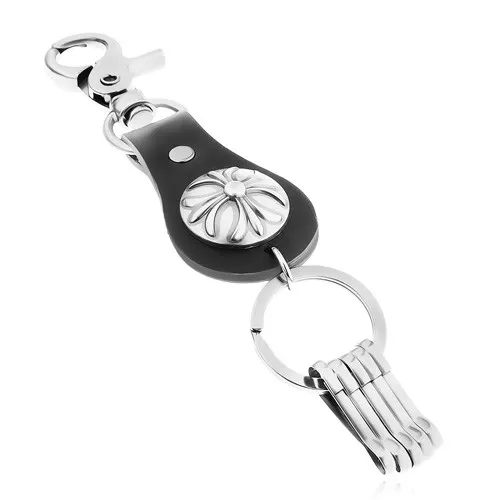 Patinovaný prívesok na kľúče v tmavosivom odtieni, ľaliový kríž v kruhu