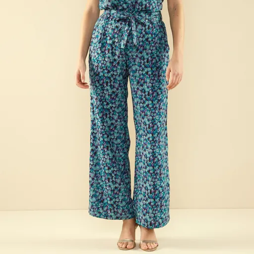 Široké splývavé nohavice s drobnou potlačou