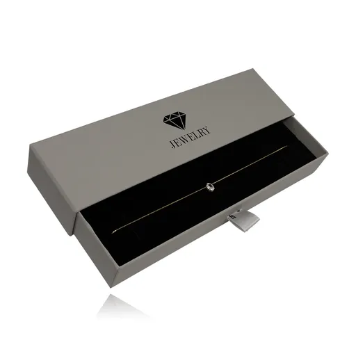 Šedá vysúvacia papierová krabička na náramok JEWELRY s motívom briliantu